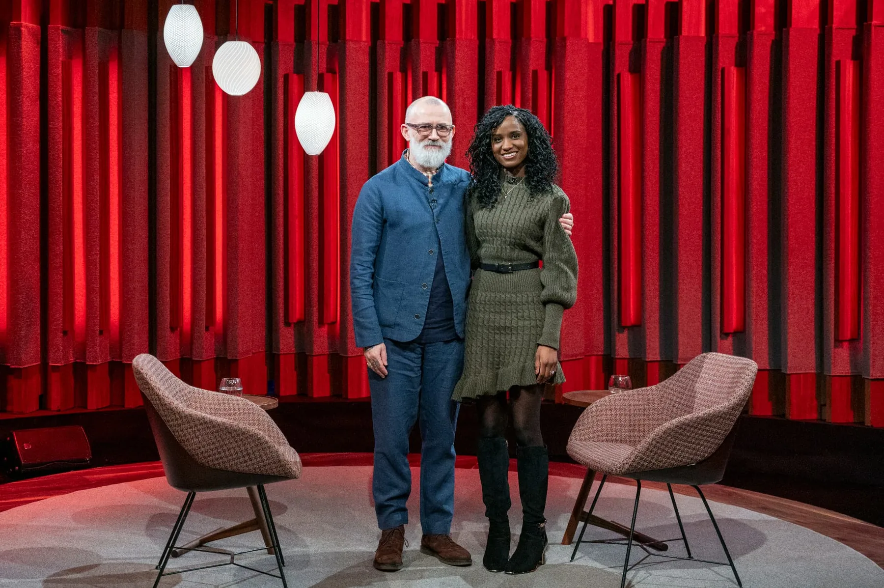 Elizabeth Zion standing on stage with Tommy Tiernan on The Tommy Tiernan Show