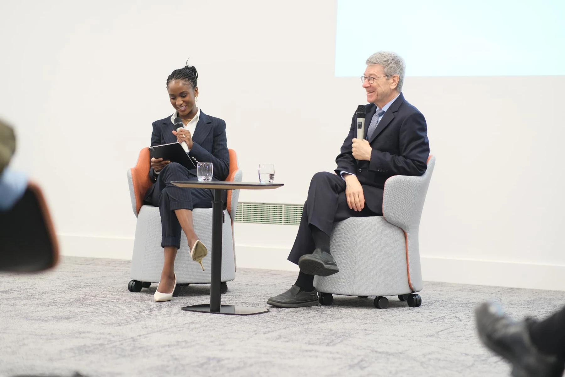 Elizabeth Zion moderating a conversation with Jeffrey Sachs
