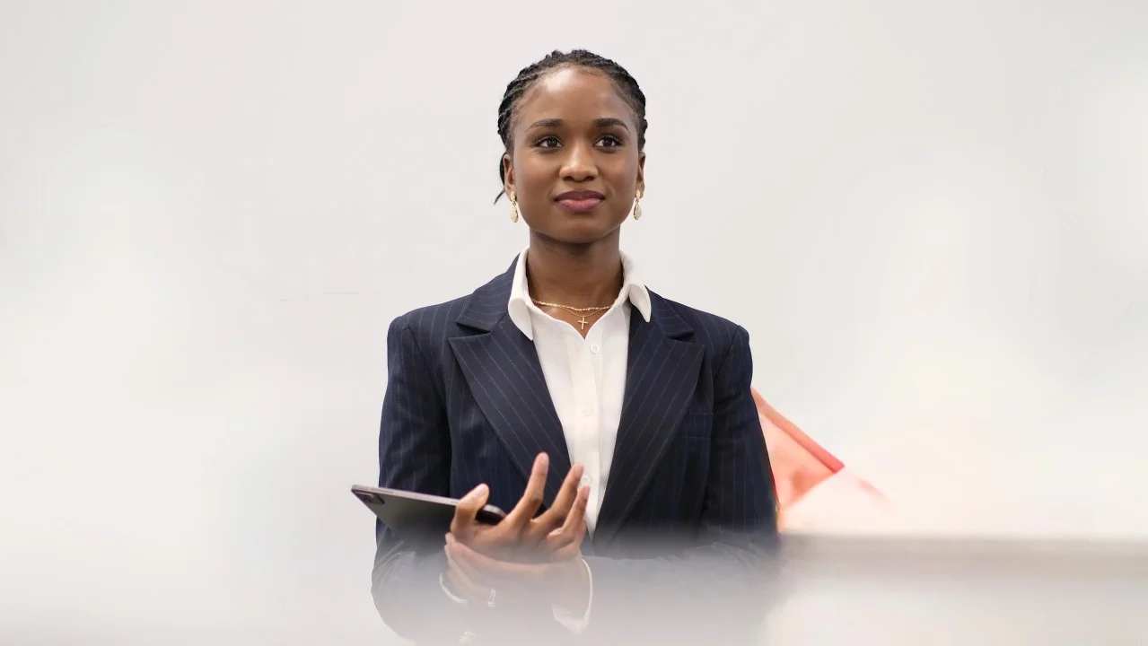Elizabeth Zion speaking at a lectern